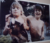 wildlife catch animal service boy holding armadillo